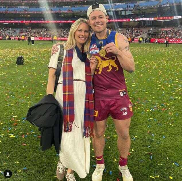 Звезда AFL Лачи Нил и его жена Джулс отпраздновали еще одну захватывающую веху после победы его команды Brisbane Lion в Гранд-финале в субботу.