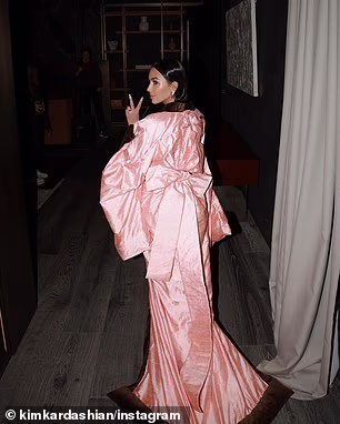 In some photos, she showcased the intricate design of the kimono and the design on the back, throwing up a peace sign in several pictures